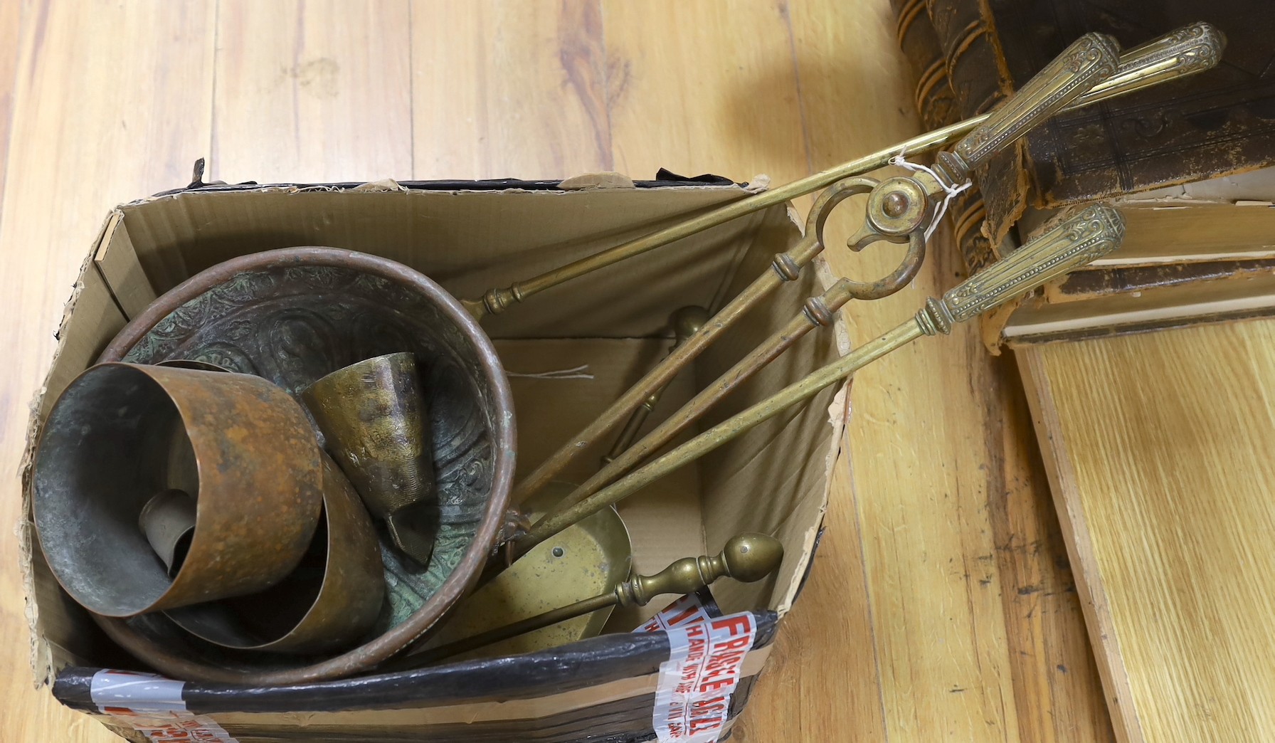 A set of three Georgian gilt bronze fire implements, a similar brass shovel and sundries